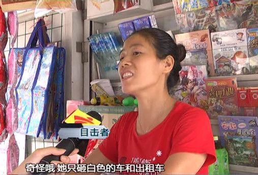 广州一女子马路上拿起工地钢筋 狂砸行驶车辆