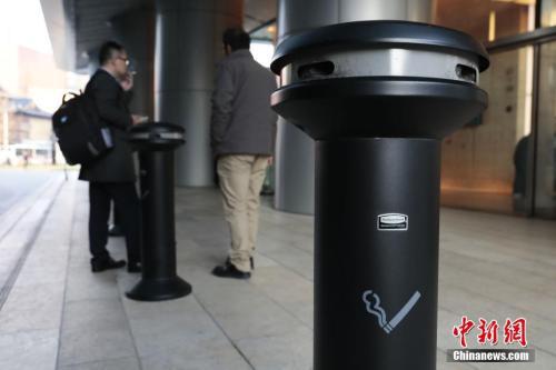 资料图:吸烟点标识。中新社记者 张亨伟 摄