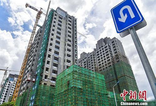 资料图:一处在建的楼盘。 中新社记者 骆云飞 摄