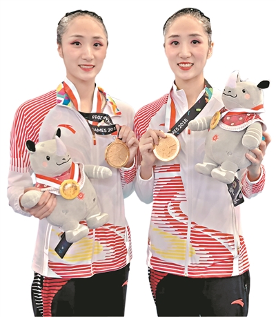 对于首次参加亚运会和世锦赛都夺冠，王氏姐妹深感幸运。