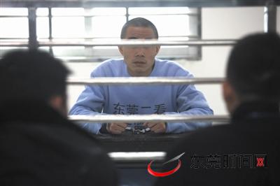 昨日,在东莞市第二看守所里,犯罪嫌疑人康某多次提到自己很后悔。(首席记者 陈帆 摄)