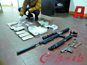 警方缴获的毒品和枪支。