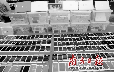 江门“3·08”系列盗销手机专案追回的赃物（部分）。南方日报记者 郭智军 实习生 胡文迪 摄