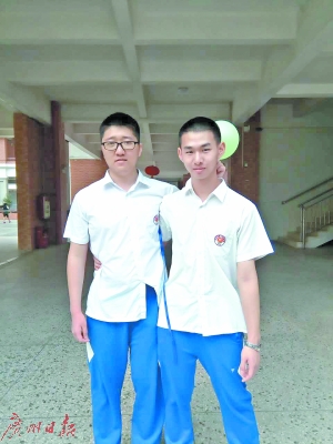 张熊辉（右）4岁就读小学了，他表示，年纪几乎没有困扰过自己。（当事人供图）