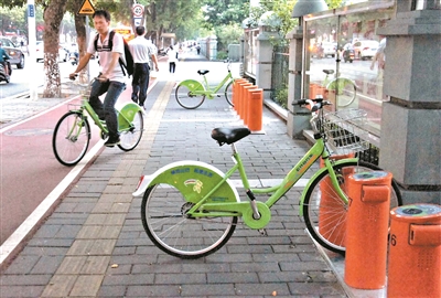 公共自行车今起可以“扫码租车”。