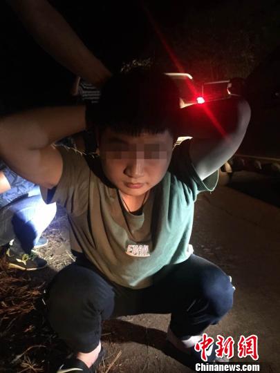 落网疑犯 蔡明亮 摄