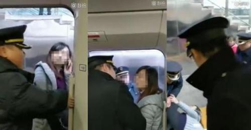 女子阻拦高铁发车视频截图。网络视频截图