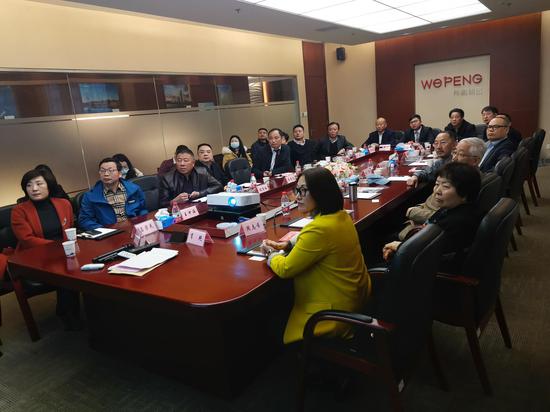 在伟鹏团体访问漫谈