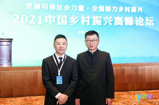 姜鹏和中国民族贸易促进会会长蓝军