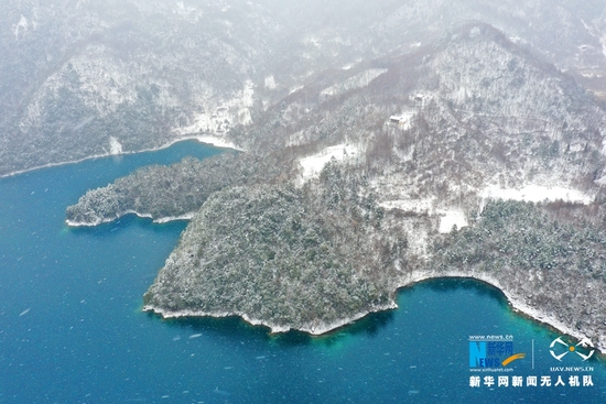 2022年2月7日,雪中的甘肃陇南文县天池景区,景色旖旎,宛如水墨画卷。新华网发 (冉创昌 摄)