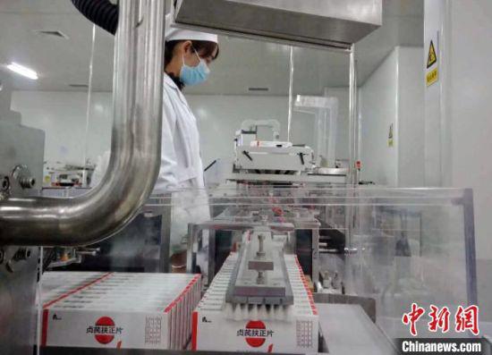 图为甘肃兰药药业抗“疫”辅助药品生产线。 兰药药业供图 摄