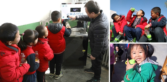 阁楼小学孩子们拿着新水杯畅饮经过过滤净化后的放心水