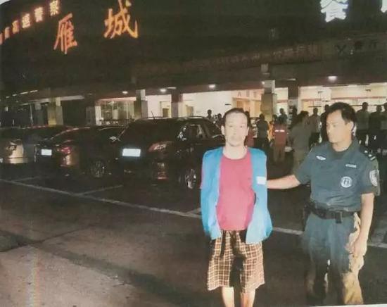 图为喻国山指认现场照片