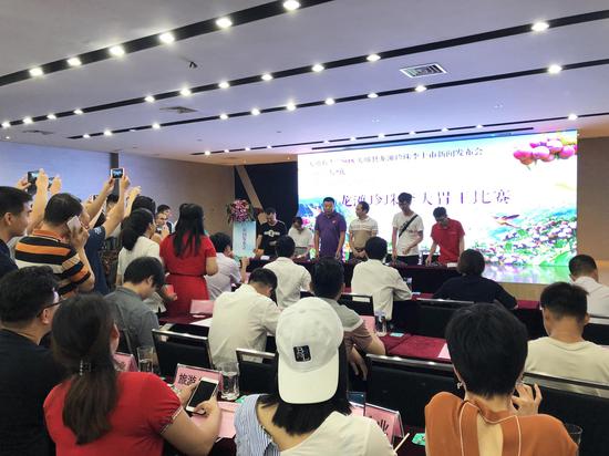 发布会现场还举行了龙滩珍珠李大胃王比赛、产销合作签约仪式