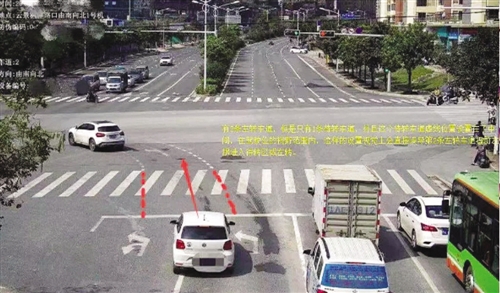 整改前,小车压实线变道进入左转待转区被抓拍