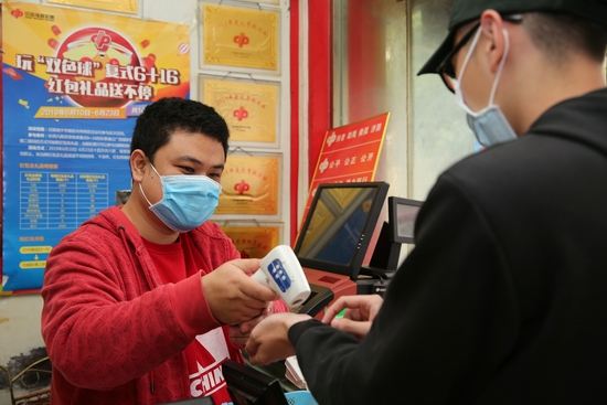(广西福彩投注站严格落实常态化疫情防控措施)