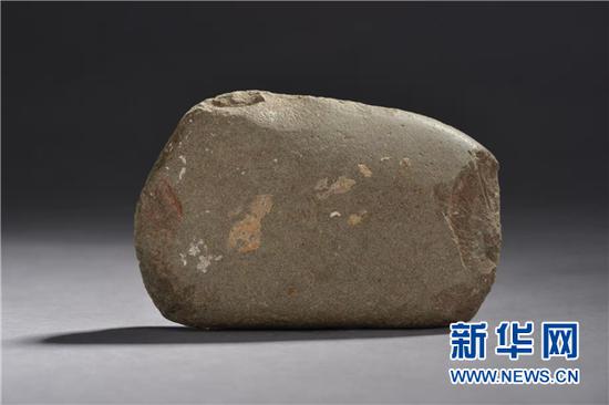 招果洞遗址出土的通体磨光石器。(贵州省文物考古研究所供图)