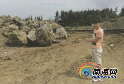谭某照
