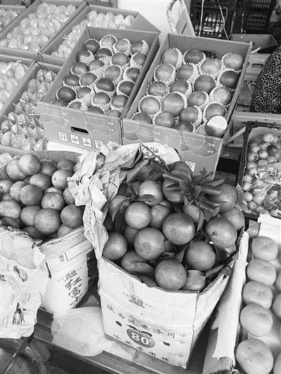 海口南北水果市场销售的冒牌琼中绿橙