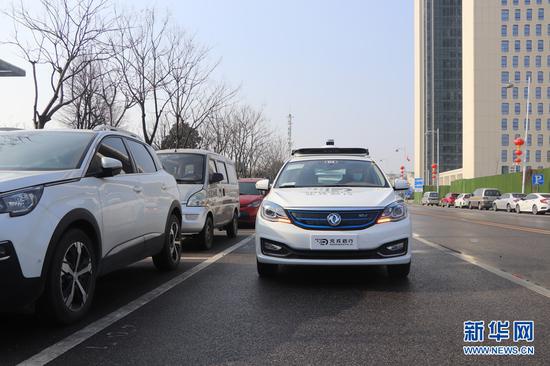 东风风神Robotaxi自动驾驶出租车正在进行测试 新华网发