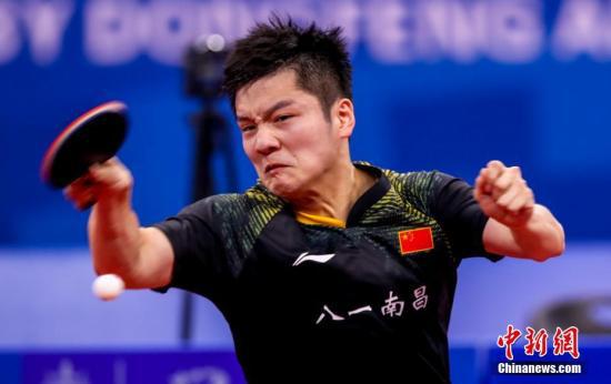 资料图：中国八一队樊振东在军运会乒乓球比赛中。中新社记者 张畅 摄