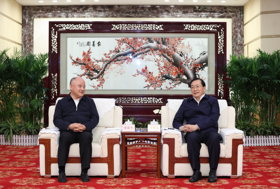 王忠林与中国安能集团董事长周国平一行座谈