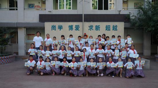 华润怡宝百图计划携手重点小学开展读书募书活