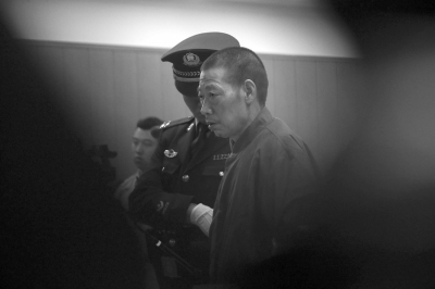 庞某在法庭上受审。京华时报记者赵思衡摄