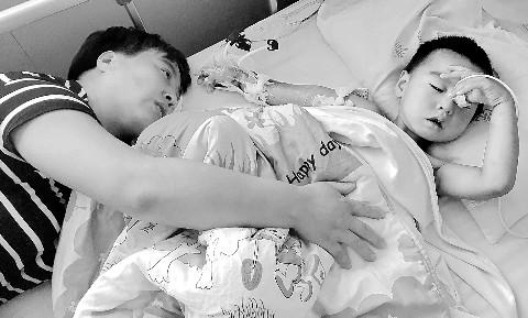 3岁男童右臂绞进脱粒机父亲因没钱欲给孩子截