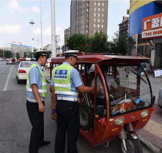 治理三轮车