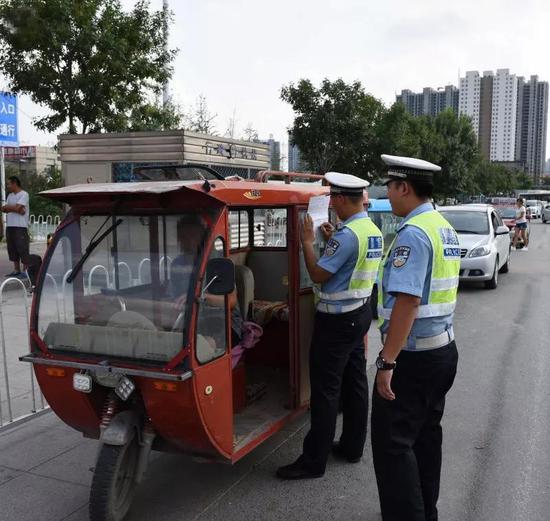 治理三轮车