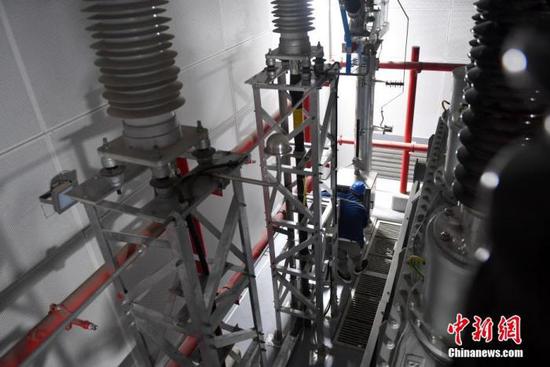 图为5月28日,河西110千伏输变电工程建设现场。 中新社记者 韩冰 摄