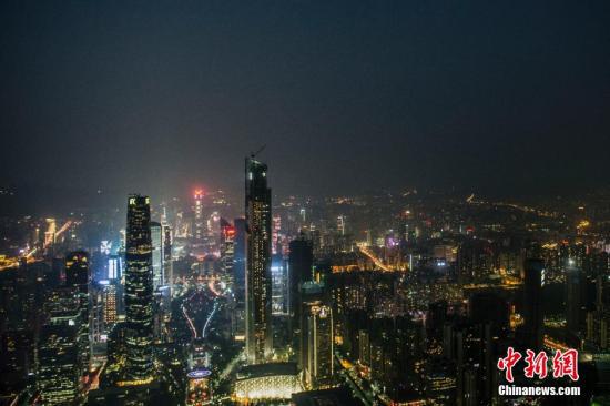 资料图:夜色中的广州。 中新社发 龙宇阳 摄