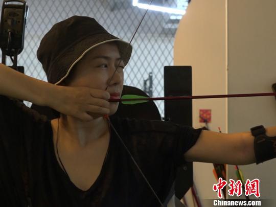 袁敏的拉弓力道比以前减少很多。 魏尧 摄
