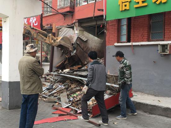 改观：商户由“不配合”变成“主动拆”