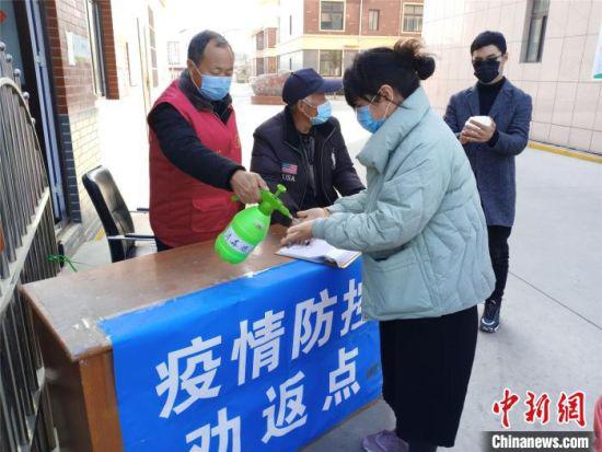 疫情期间,河南基层社区加强检疫防控(资料图 韩章云 摄
