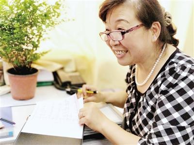 張愛紅的筆記本上記著每一個宿舍的學(xué)生名字