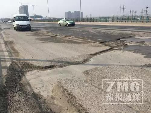 300米橋面大坑百余個(gè)