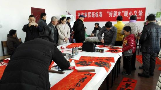 書法家揮毫祝春