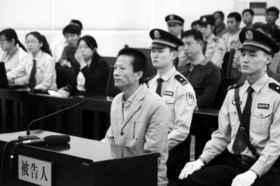 庭审现场,被告人神色黯然