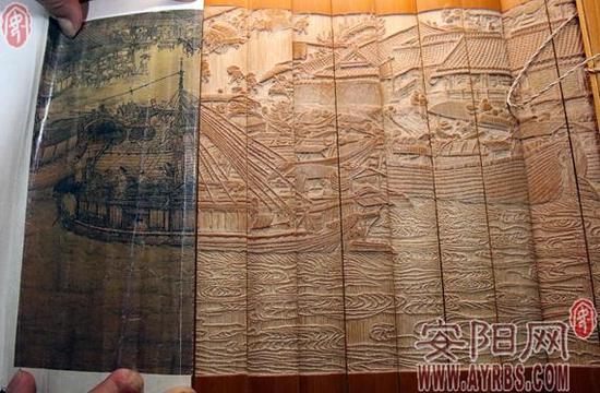 王建安展示竹雕作品