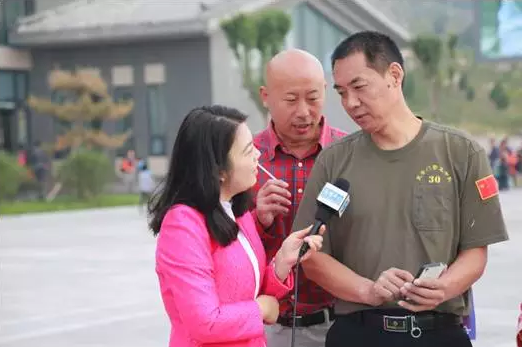 曾在国旗班服役的刘班长向记者述说自己的激动心情