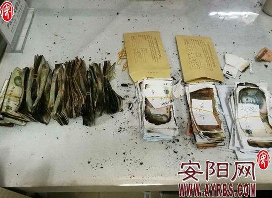 被烧得残破不堪的人民币