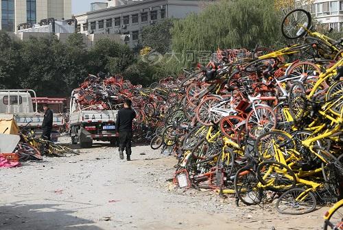郑州万辆共享单车被扣?几家单车企业再次承诺