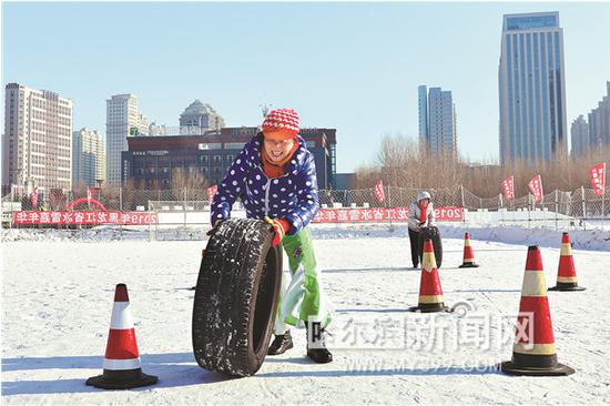 雪地推轮胎比赛。