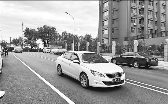 江堤二巷路投用后改善了区域交通环境。 本报记者邢汉夫摄