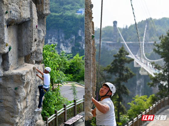 游客在景区体验攀岩。