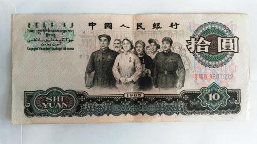 图为网友“志坚”家里的旧纸币
