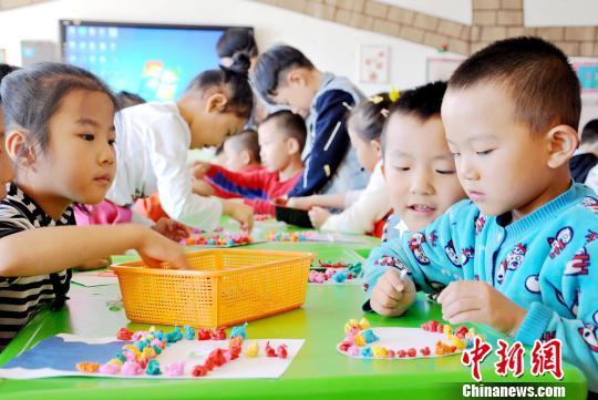 资料图:幼儿园中的孩子们。 张渊 摄