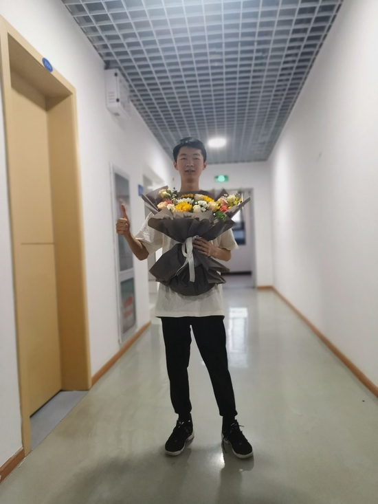 (图为贺文。)